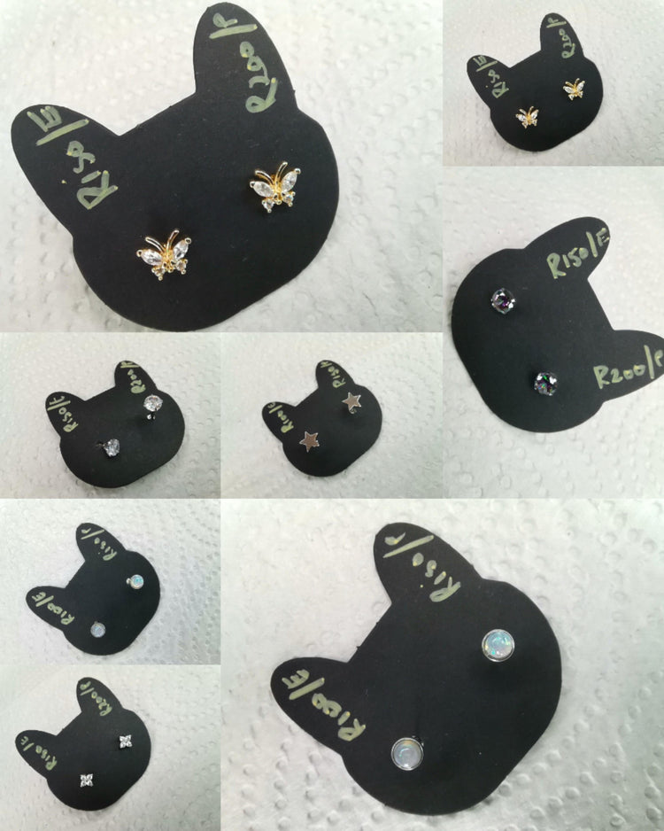 TBC piercing jewellery options including butterfly and gemstone designs